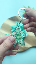 Load and play video in Gallery viewer, Double-Sided Sea Turtle Keychain
